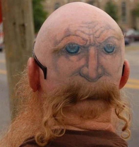 Weirdest tattoos ever! face tattoo on the back of his head