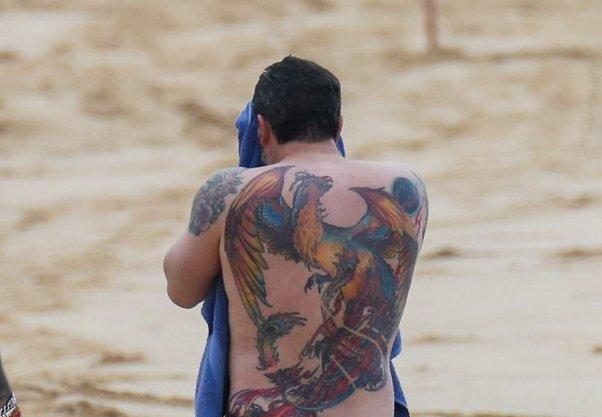 Ben Affleck back tattoo removal